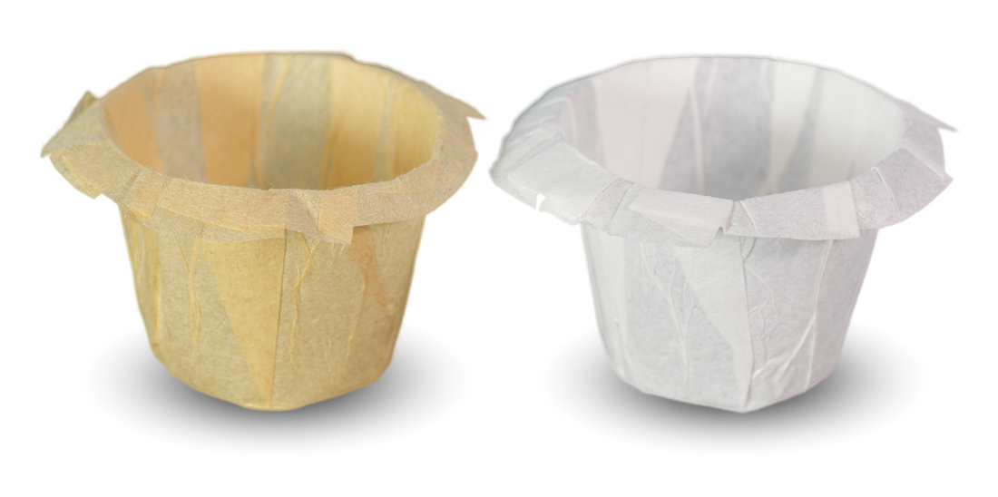 Unbleached brown coffee filter next to a white coffee filter